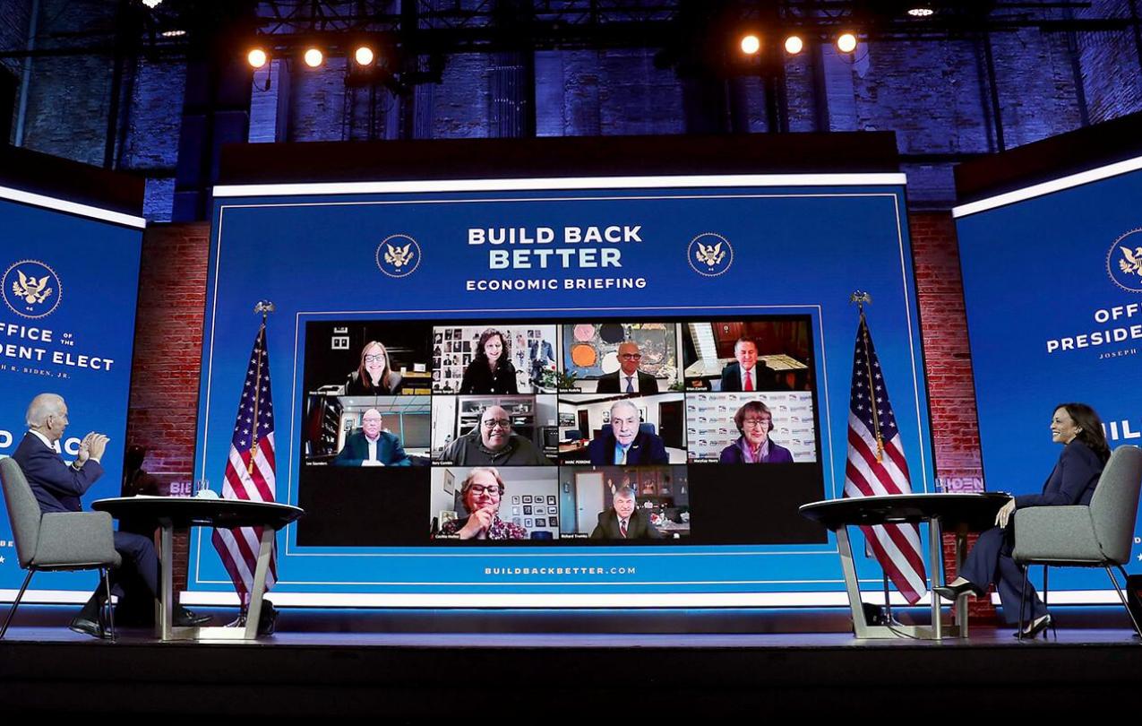 U.S. President-elect Joe Biden and Vice President-elect Kamala Harris receive a briefing on the economy in a Zoom meeting with union and business leaders in Wilmington, Delaware. (Photo by Joe Raedle/Getty Images)