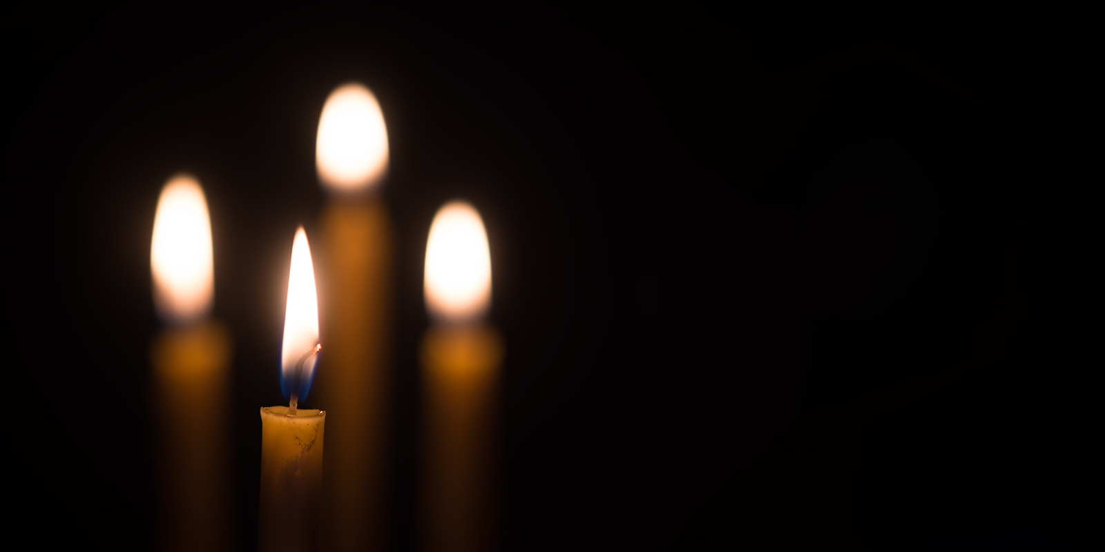 Candles in dark room